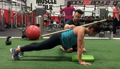 demonstration on spinal alignment during a push-up