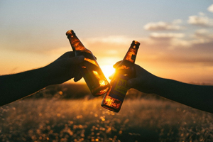 people cheers with bottles